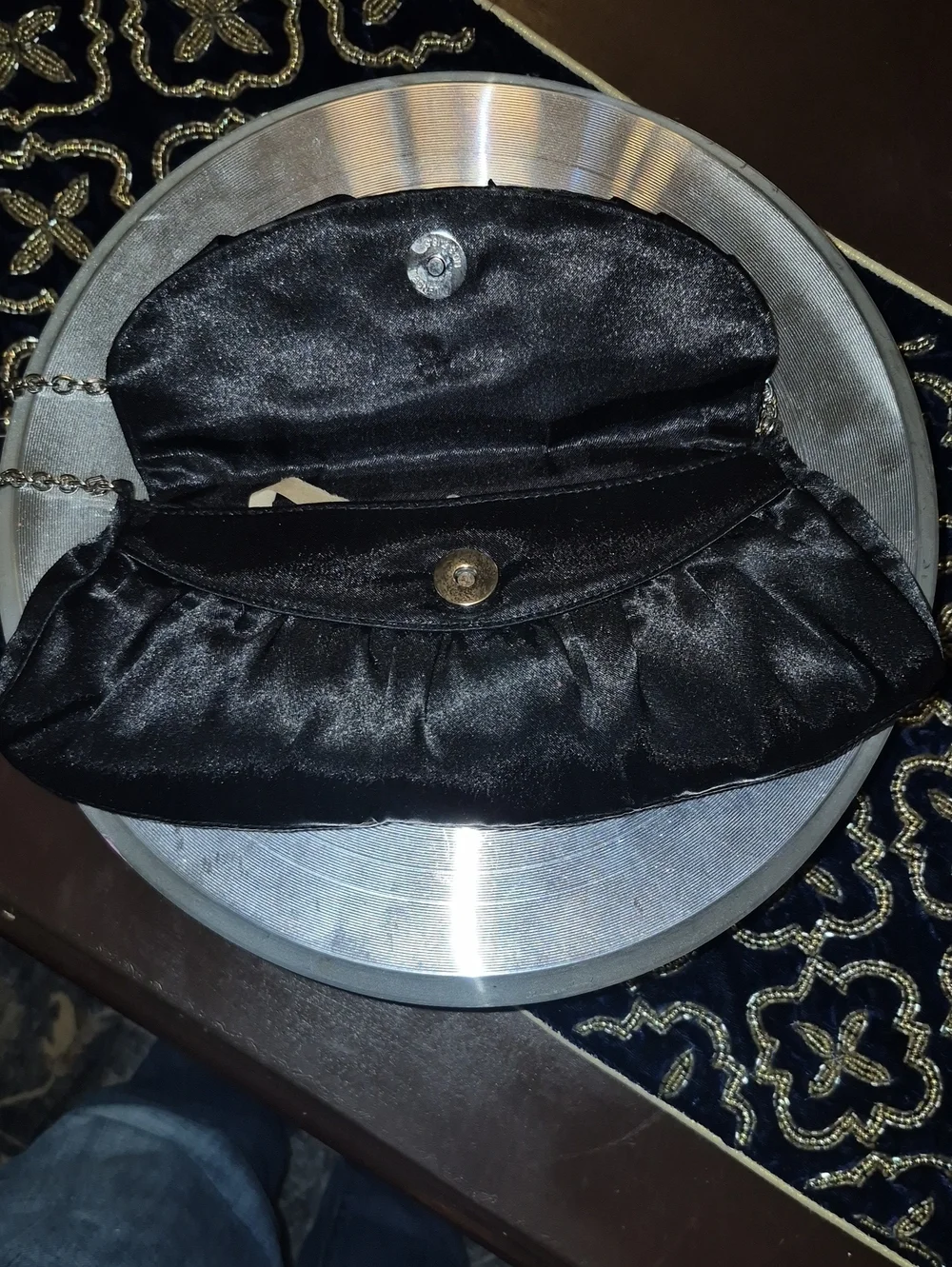 Vintage: A black satin foldover evening bag. Satin Bow& Rusch Pleating &tassels
